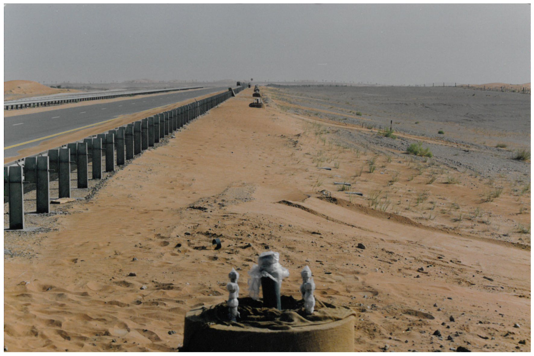 Lighting pole installation along Jebel Hafeet highway, 1991